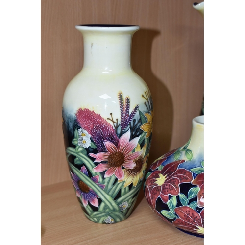 405 - FOUR PIECES OF OLD TUPTON WARE, comprising a jug and a vase in Summer Bouquet pattern, a squat vase ... 