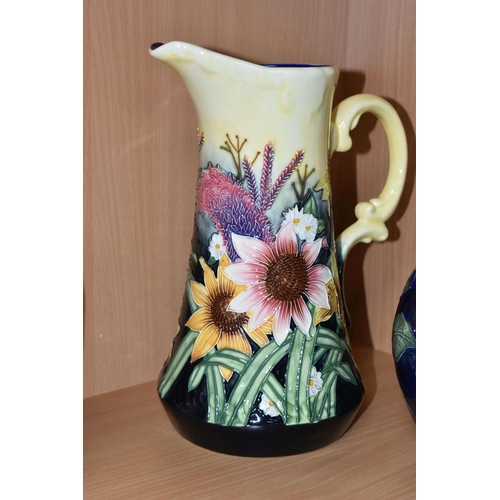 405 - FOUR PIECES OF OLD TUPTON WARE, comprising a jug and a vase in Summer Bouquet pattern, a squat vase ... 