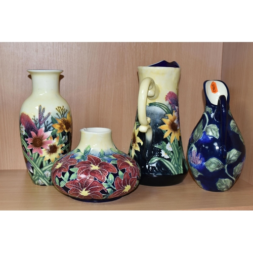 405 - FOUR PIECES OF OLD TUPTON WARE, comprising a jug and a vase in Summer Bouquet pattern, a squat vase ... 