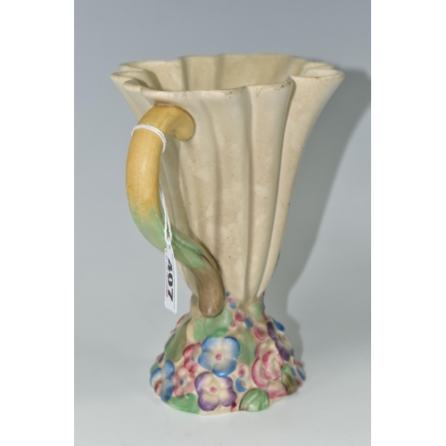 407 - A CLARICE CLIFF 'MY GARDEN' JUG, of conical fluted form with floral base, bearing an indistinct blue... 