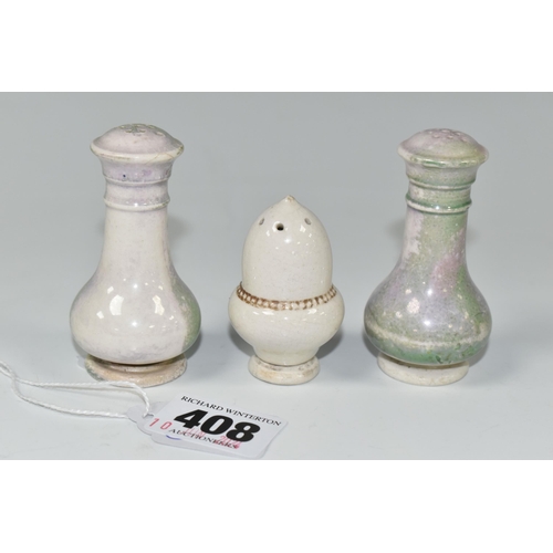 408 - THREE MOORCROFT POTTERY PEPPER POTS, one of acorn form, the other two with the remains of a green-bl... 