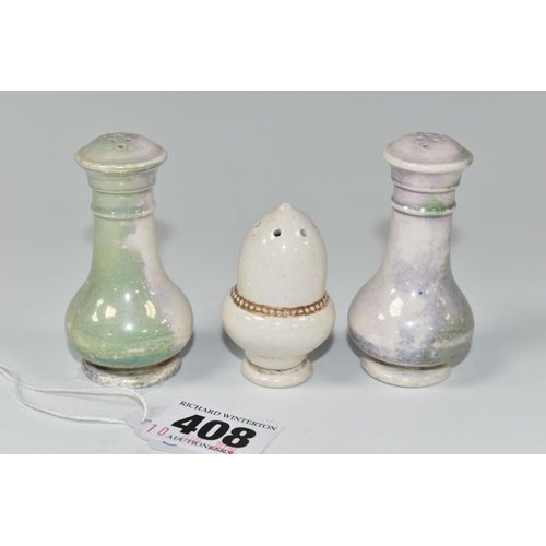 408 - THREE MOORCROFT POTTERY PEPPER POTS, one of acorn form, the other two with the remains of a green-bl... 