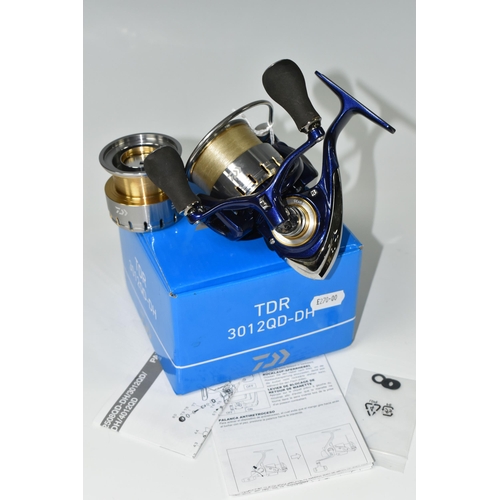 411 - A BOXED DAIWA TDR 3012 QD-DH FISHING REEL, complete with spare spool and instructions, Condition Rep... 