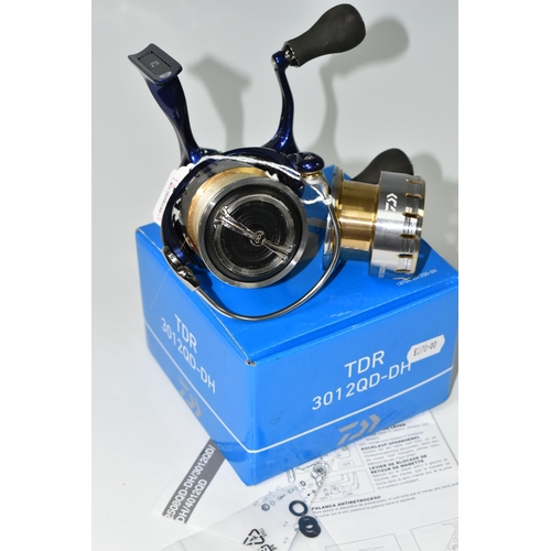 411 - A BOXED DAIWA TDR 3012 QD-DH FISHING REEL, complete with spare spool and instructions, Condition Rep... 