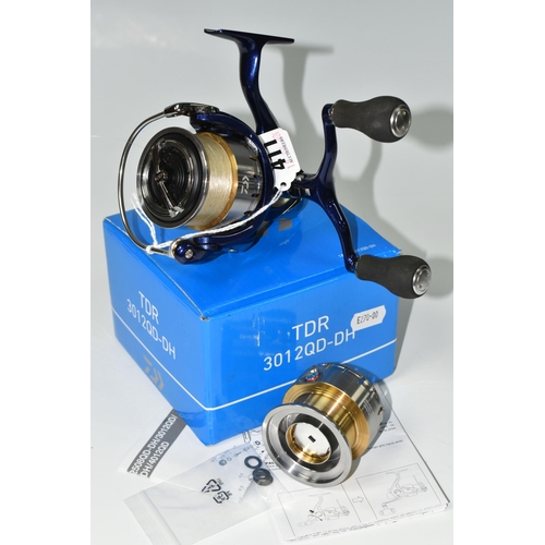 411 - A BOXED DAIWA TDR 3012 QD-DH FISHING REEL, complete with spare spool and instructions, Condition Rep... 