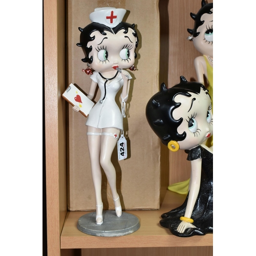 424 - THREE RESIN BETTY BOOP FIGURES, 'Westland Giftware' comprising 'Nurse Betty', 'Betty in Yellow Glitt... 