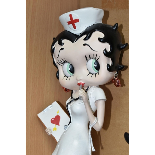 424 - THREE RESIN BETTY BOOP FIGURES, 'Westland Giftware' comprising 'Nurse Betty', 'Betty in Yellow Glitt... 