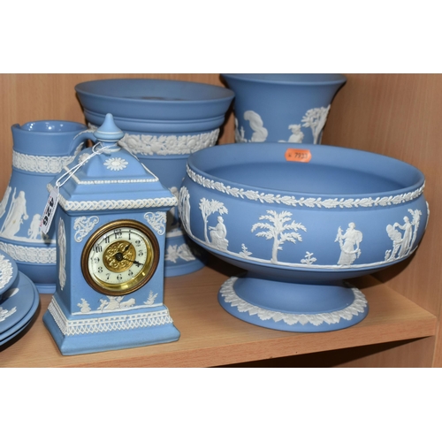 426 - A COLLECTION OF WEDGWOOD BLUE JASPERWARE, comprising a commemorative cabinet plate 'Man On The Moon-... 