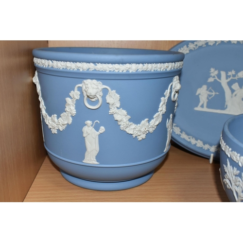 426 - A COLLECTION OF WEDGWOOD BLUE JASPERWARE, comprising a commemorative cabinet plate 'Man On The Moon-... 