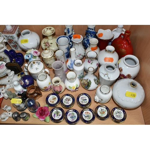 430 - A QUANTITY OF NAMED CERAMICS, comprising six porcelain pin cushion doll tops, a quantity of miniatur... 