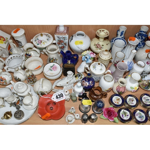 430 - A QUANTITY OF NAMED CERAMICS, comprising six porcelain pin cushion doll tops, a quantity of miniatur... 