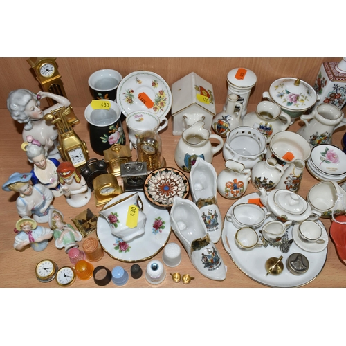 430 - A QUANTITY OF NAMED CERAMICS, comprising six porcelain pin cushion doll tops, a quantity of miniatur... 