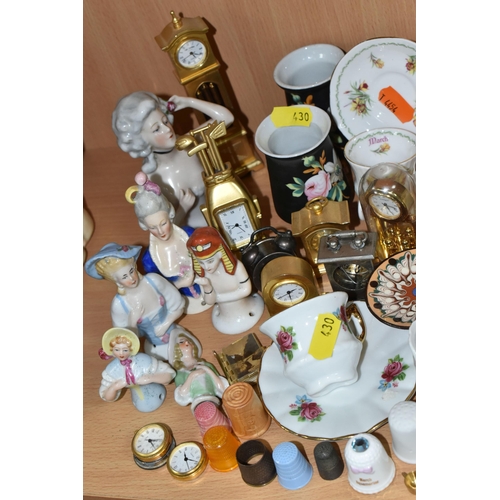 430 - A QUANTITY OF NAMED CERAMICS, comprising six porcelain pin cushion doll tops, a quantity of miniatur... 