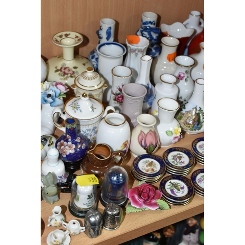 430 - A QUANTITY OF NAMED CERAMICS, comprising six porcelain pin cushion doll tops, a quantity of miniatur... 