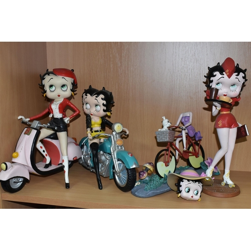 433 - FOUR RESIN BETTY BOOP FIGURES, 'Westerland', comprising  'Scooter Betty', 'Motorcycle Betty', 'Rolle... 