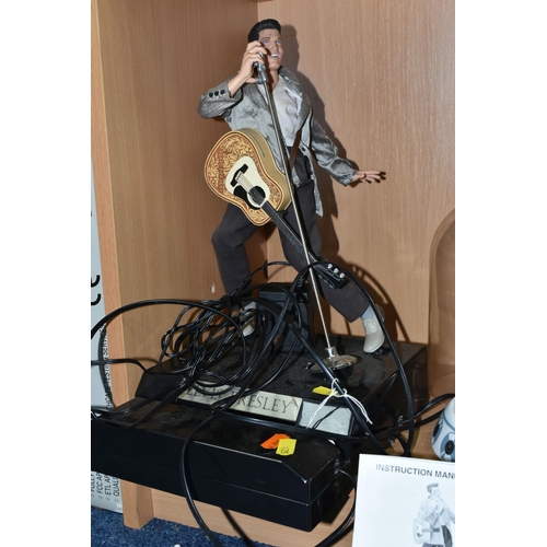 435 - A BOXED TELEMANIA ELVIS TELEPHONE, comprising a singing and dancing telephone DM-221-002 with instru... 