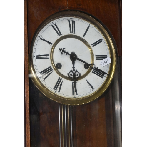 437 - TWO WALL CLOCKS, comprising a Victorian mahogany school/waiting room clock, black painted Roman nume... 