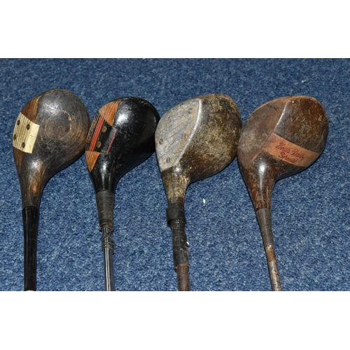 444 - A COLLECTION OF SEVENTEEN VINTAGE GOLF CLUBS, to include woods and drivers etc.