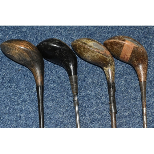 444 - A COLLECTION OF SEVENTEEN VINTAGE GOLF CLUBS, to include woods and drivers etc.