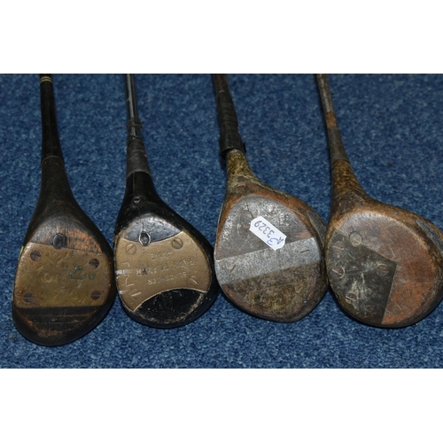 444 - A COLLECTION OF SEVENTEEN VINTAGE GOLF CLUBS, to include woods and drivers etc.