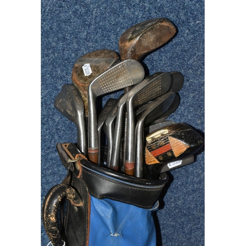 444 - A COLLECTION OF SEVENTEEN VINTAGE GOLF CLUBS, to include woods and drivers etc.