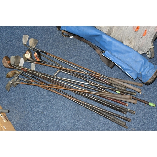 444 - A COLLECTION OF SEVENTEEN VINTAGE GOLF CLUBS, to include woods and drivers etc.