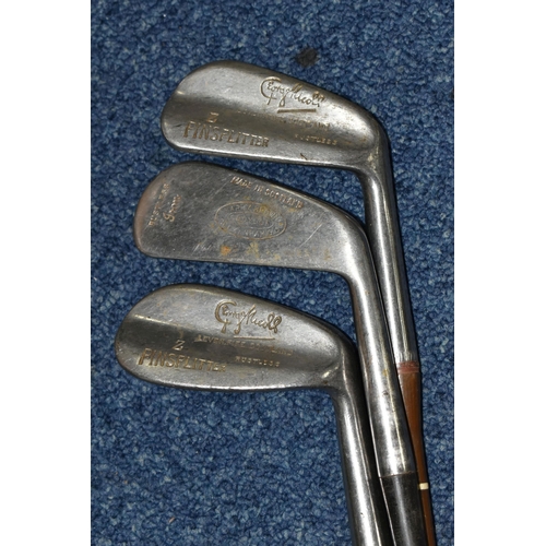 444 - A COLLECTION OF SEVENTEEN VINTAGE GOLF CLUBS, to include woods and drivers etc.