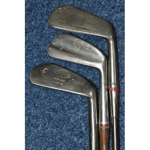 444 - A COLLECTION OF SEVENTEEN VINTAGE GOLF CLUBS, to include woods and drivers etc.