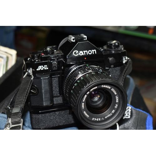 451 - VINTAGE CANON PHOTOGRAPHIC EQUIPMENT ETC, to include a Canon A1 SLR camera body fitted with a Canon ... 