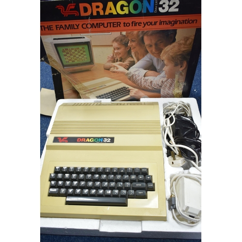 482 - A DRAGON 32 COMPUTER WITH GAMES, games includes Frogger and Astro Blast, computer is in working cond... 