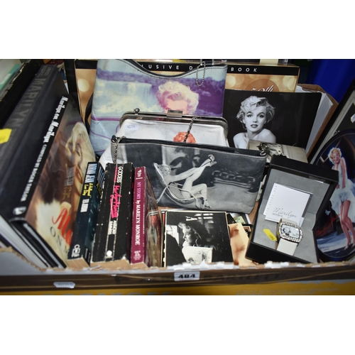 484 - TWO BOXES OF MARILYN MONROE THEMED BOOKS, HAND BAGS AND A QUANTITY OF LOOSE FRAMED PRINTS, to includ... 