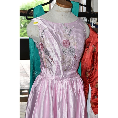 504 - TWENTY FOUR PIECES OF VINTAGE LADIES' AND CHILDREN'S CLOTHING, comprising five 1950's/60's evening d... 