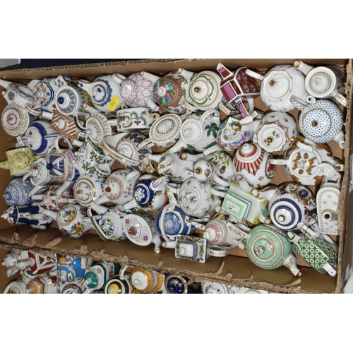 518 - TWO BOXES OF 'PORCELAIN ART' MINIATURE TEAPOT COLLECTION, approximately ninety-four in total, variou... 