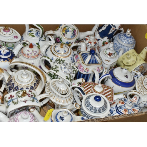 518 - TWO BOXES OF 'PORCELAIN ART' MINIATURE TEAPOT COLLECTION, approximately ninety-four in total, variou... 