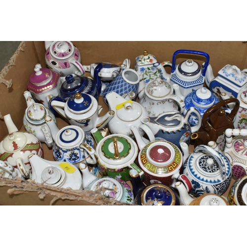 518 - TWO BOXES OF 'PORCELAIN ART' MINIATURE TEAPOT COLLECTION, approximately ninety-four in total, variou... 