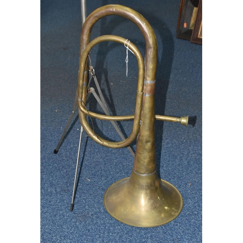 537 - A BRASS VALVELESS MUSICAL INSTRUMENT, unbranded height 58cm together with a folding metal music stan... 