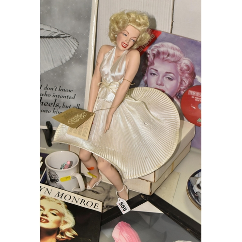 555 - A COLLECTION OF MODERN MARILYN MONROE MEMORABILIA, including six collectors plates, two boxed, a str... 