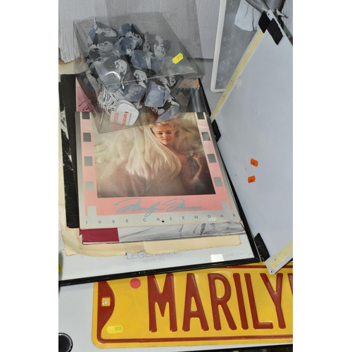 555 - A COLLECTION OF MODERN MARILYN MONROE MEMORABILIA, including six collectors plates, two boxed, a str... 