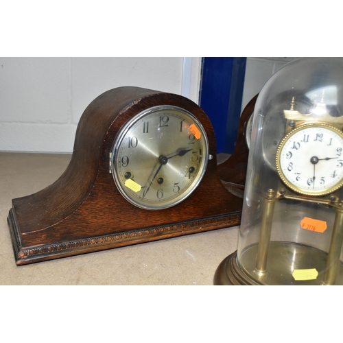 561 - A GROUP OF CLOCKS, to include anniversary clocks by Kundo and Haller, another unmarked incomplete an... 