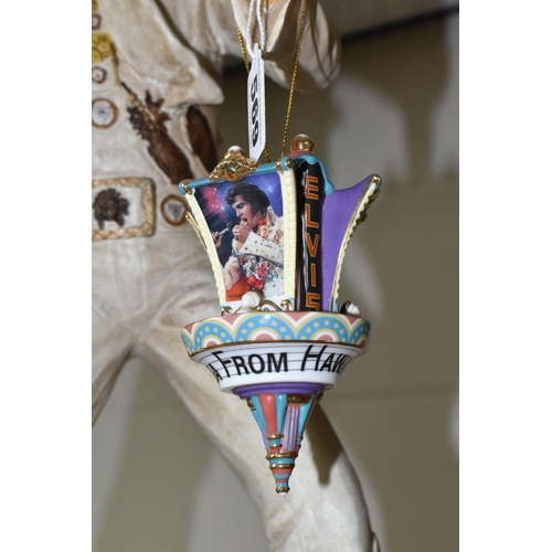 569 - A COMPOSITE FIGURE OF ELVIS PRESLEY WITH TWO HANGING ELVIS ORNAMENTS, the figure depicting Elvis per... 