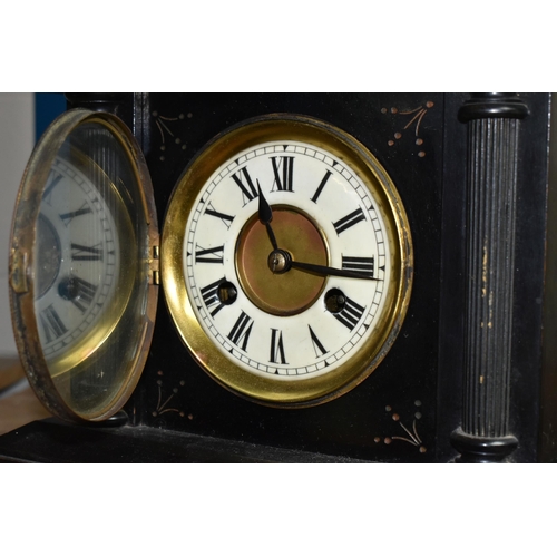 578 - A GROUP OF CLOCKS, comprising a late nineteenth century black wooden cased mantel clock, a brass bin... 