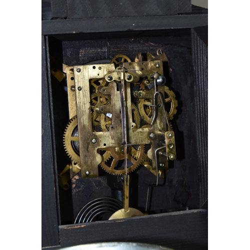 578 - A GROUP OF CLOCKS, comprising a late nineteenth century black wooden cased mantel clock, a brass bin... 