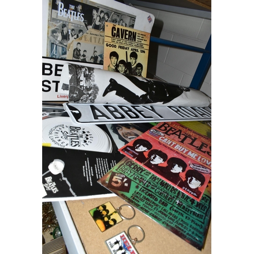 580 - A COLLECTION OF 'THE BEATLES' MEMORABILIA, to include modern metal signs, including a street sign st... 