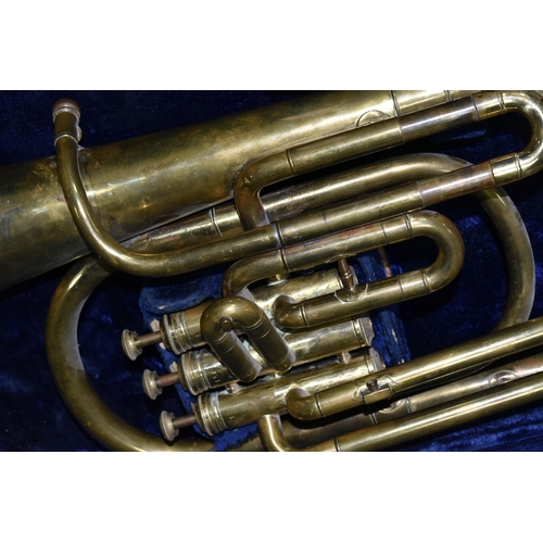 586 - A CASED LARK CORNET/BARITONE HORN, comprising a brass cornet, impressed marks Lark SHA -  M4062 in a... 