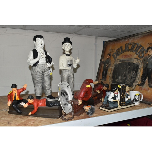 598 - EIGHT PIECES OF LAUREL AND HARDY MEMORABILIA, including two Laurel and Hardy 50cm ceramic figures, t... 