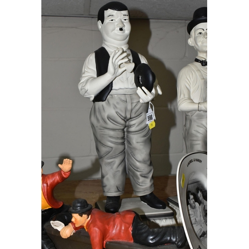 598 - EIGHT PIECES OF LAUREL AND HARDY MEMORABILIA, including two Laurel and Hardy 50cm ceramic figures, t... 