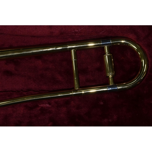 601 - BOOSEY AND HAWKES TROMBONE 400 WITH LEATHER EFFECT CARRY CASE, trombone serial no 84590, model numbe... 