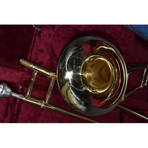 601 - BOOSEY AND HAWKES TROMBONE 400 WITH LEATHER EFFECT CARRY CASE, trombone serial no 84590, model numbe... 