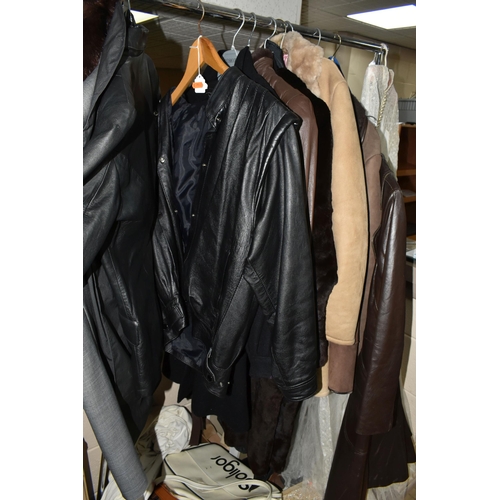 613 - FOUR BOXES, THREE SUITCASES AND LOOSE VINTAGE CLOTHING, to include two men's vintage sheepskin coats... 