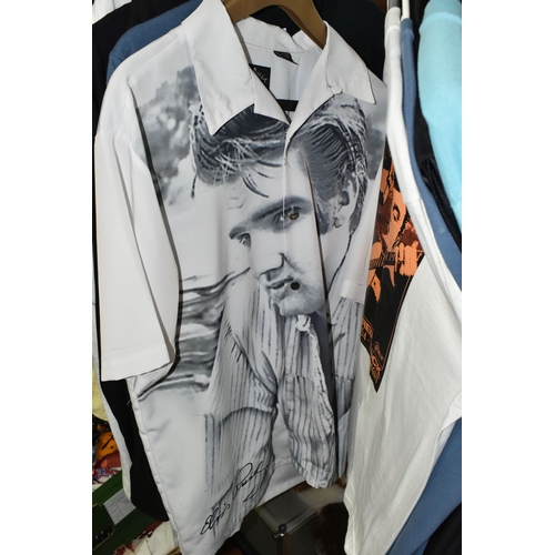 616 - A LARGE QUANTITY OF LOOSE GENTLEMENS CLOTHING, a quantity of Elvis themed T-shirts and jackets to in... 